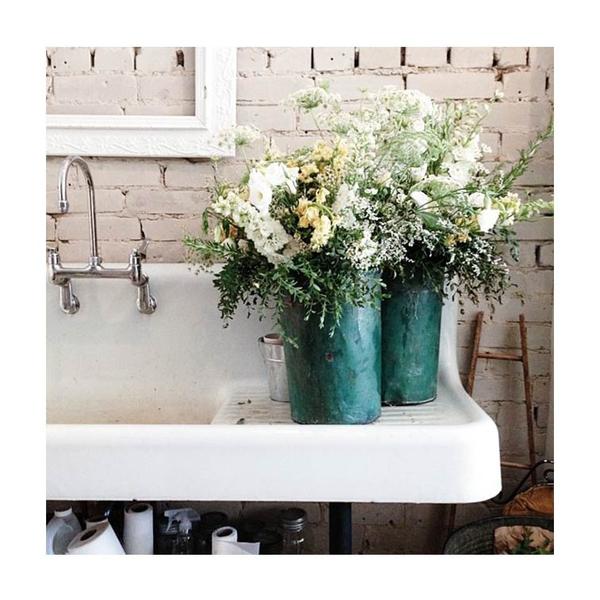 Buckets of florals by the sink. Photo print by Instagrammer and Toronto-based photographer, Trish Papadakos.  This print and another 11 for sale on the Impressed Print Shop